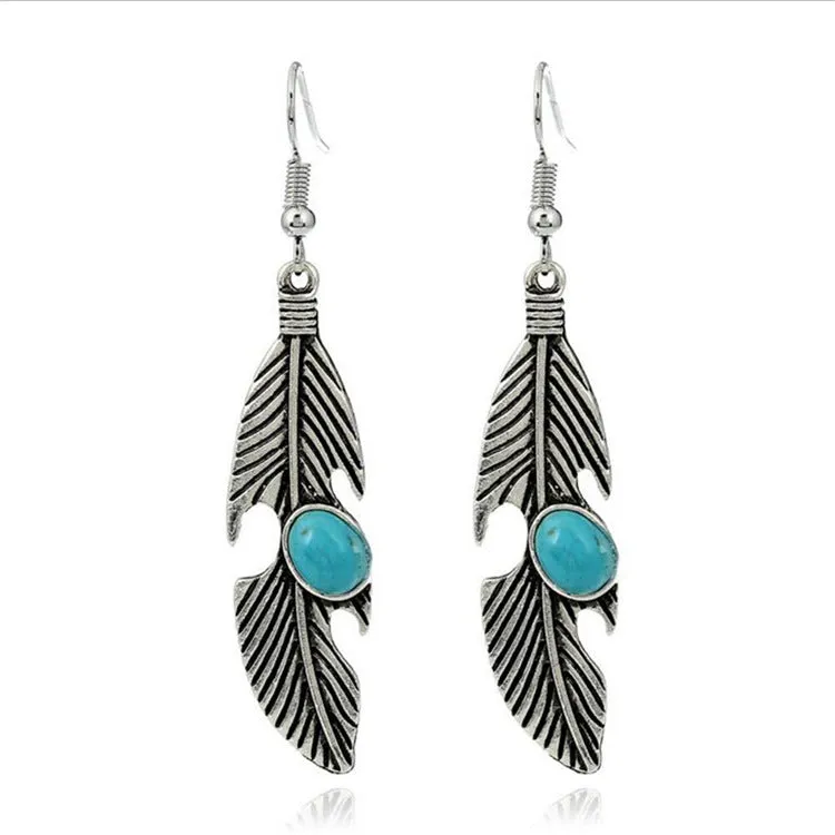 Vintage feather earrings with turquoise inlay leaf pattern in antique gold