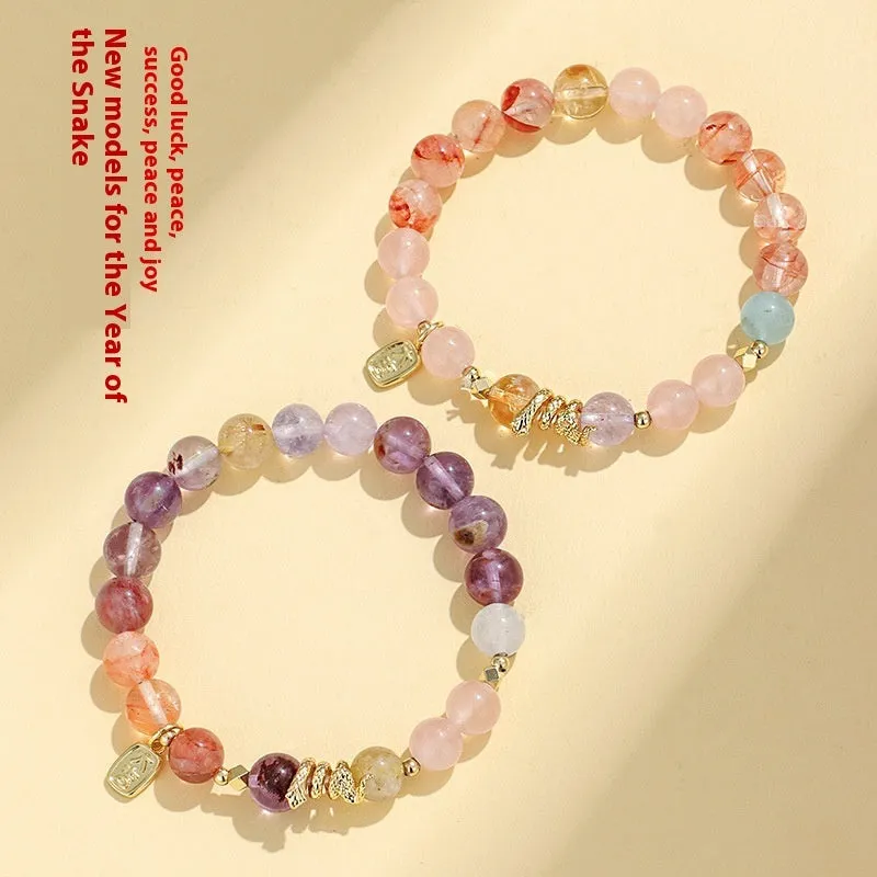 Women's lucky snake crystal bead bracelet with plastic flower decorations and beast pattern detailing