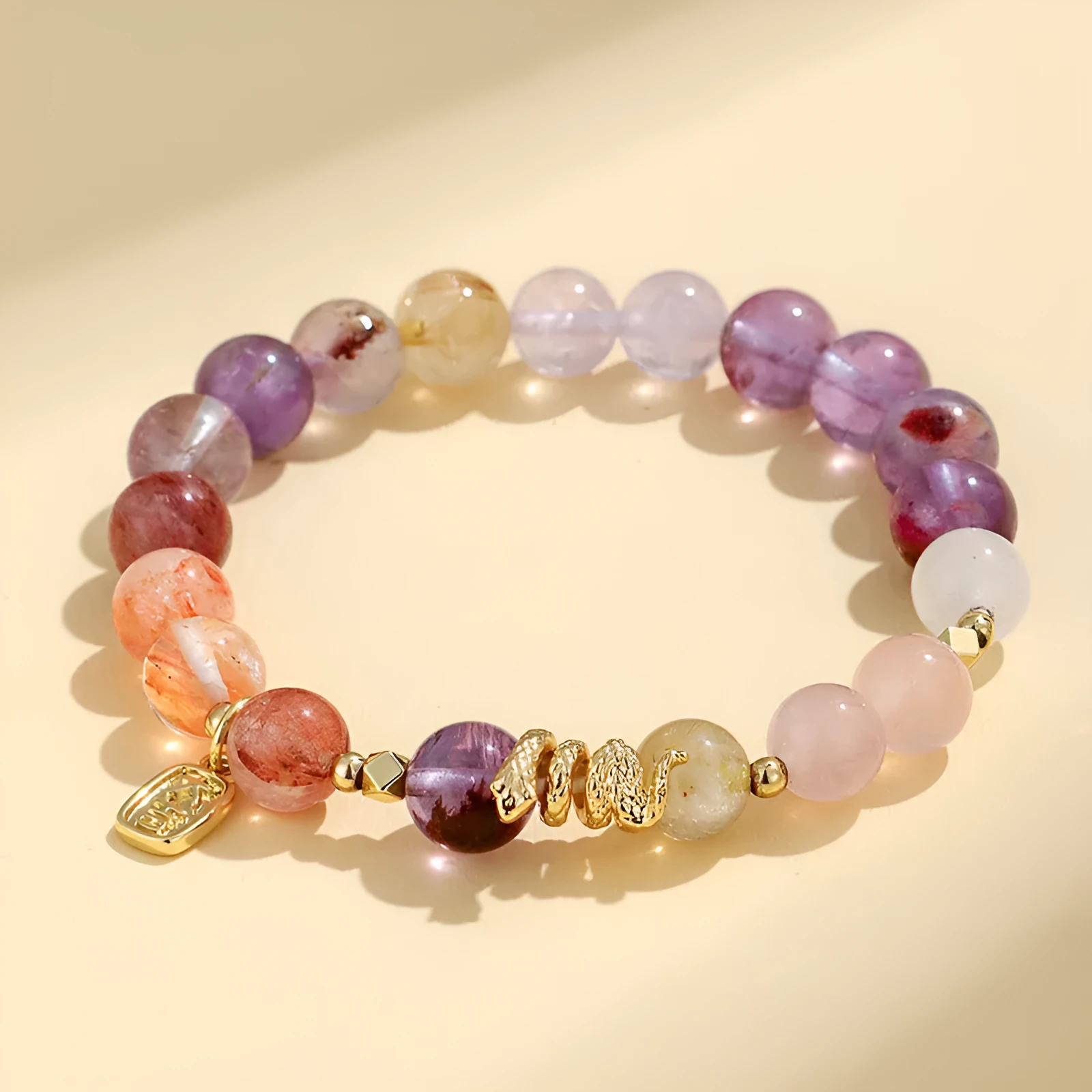 Women's lucky snake crystal bead bracelet with plastic flower decorations and beast pattern detailing