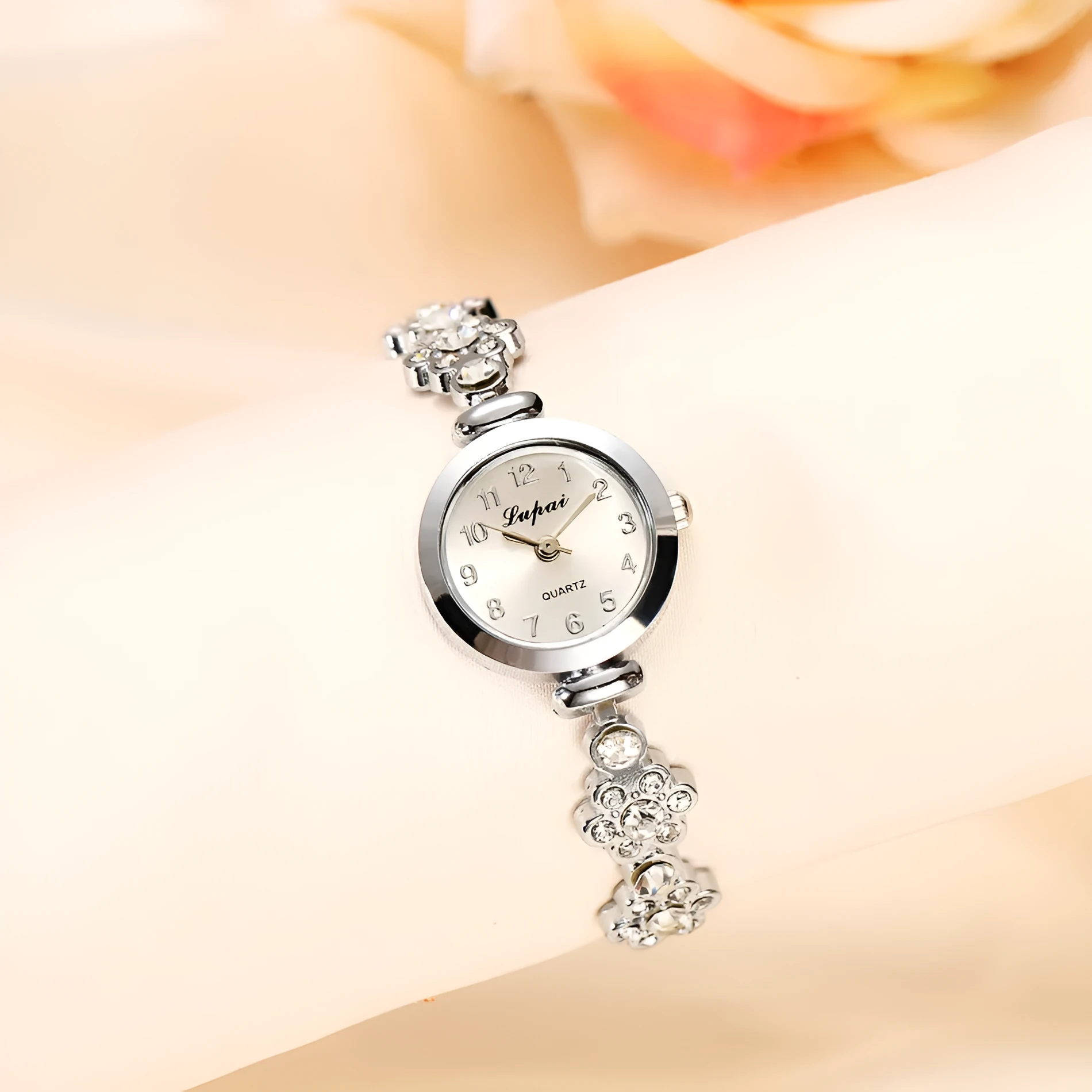 Ladies flower bracelet watch with round dial and silicone strap in gold colour
