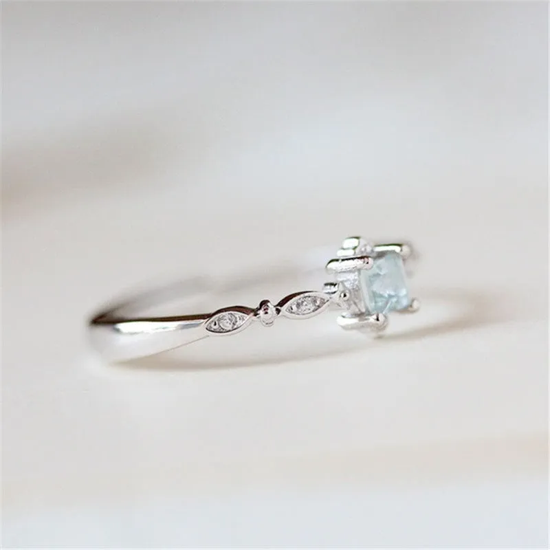 Rose gold copper ring on white background showing plain band design