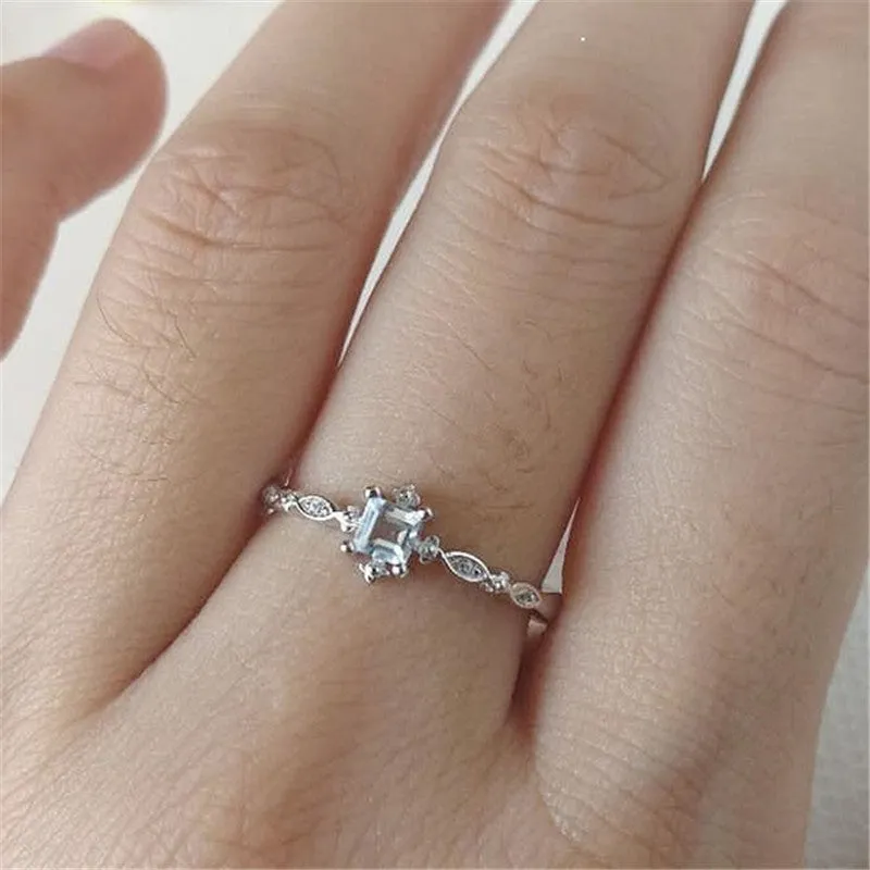 Rose gold copper ring on white background showing plain band design