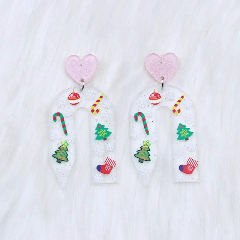 Christmas ear studs in acrylic with geometric shape and printed snowflake design, 6.5x3.1cm