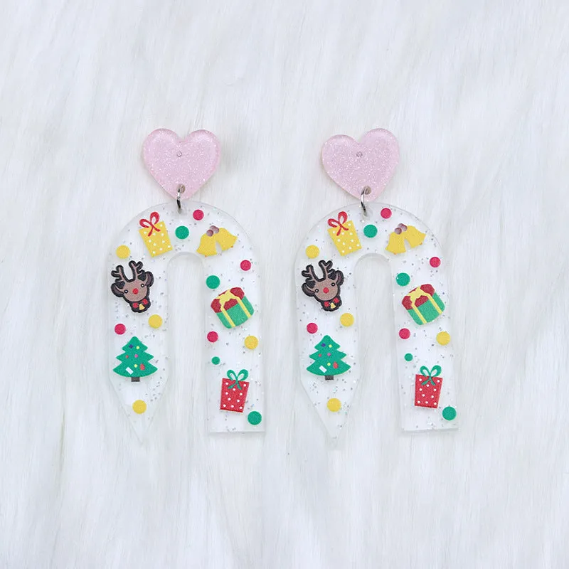 Christmas ear studs in acrylic with geometric shape and printed snowflake design, 6.5x3.1cm