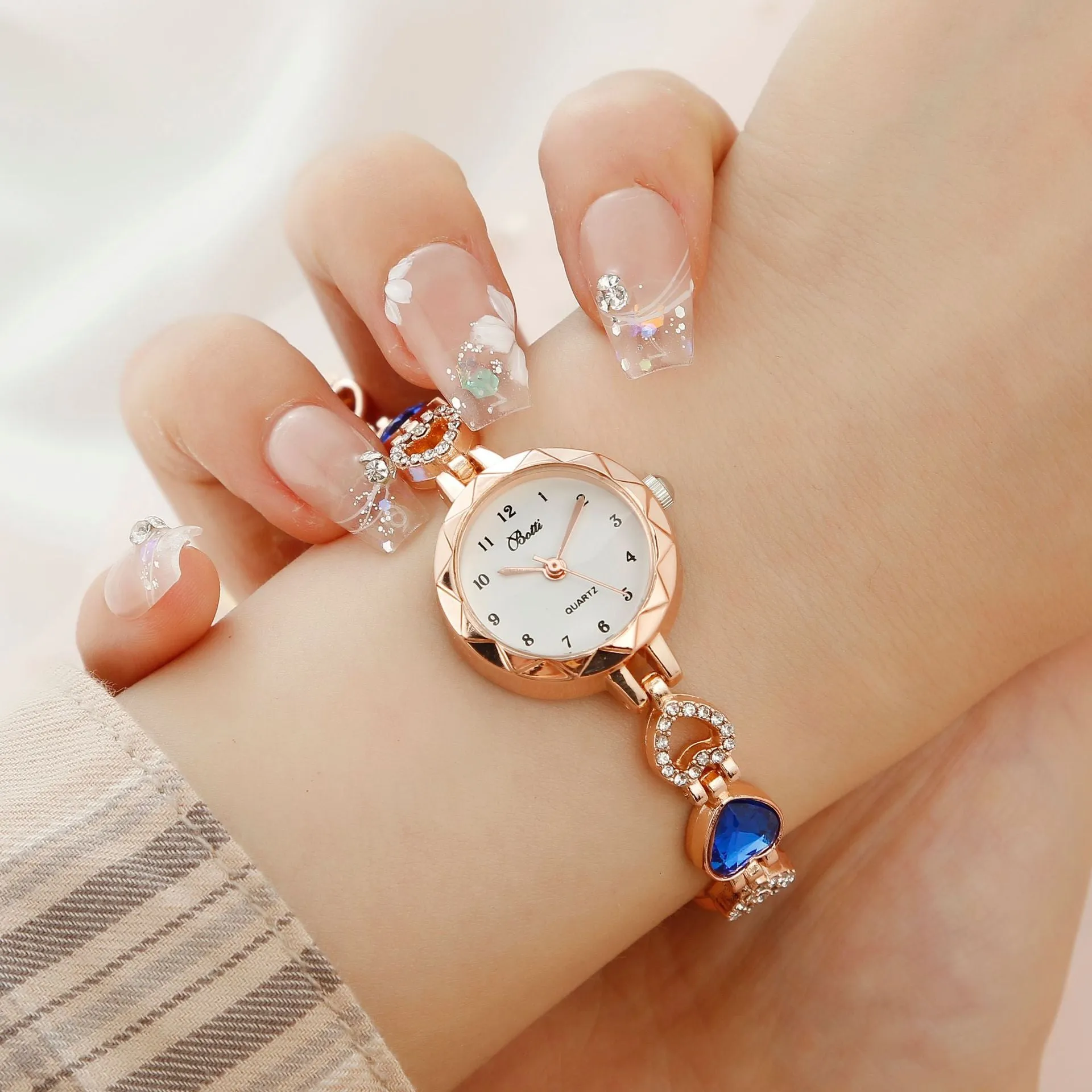 Women's simple disc light luxury quartz bracelet watch set in pink with matching earrings necklace and ring