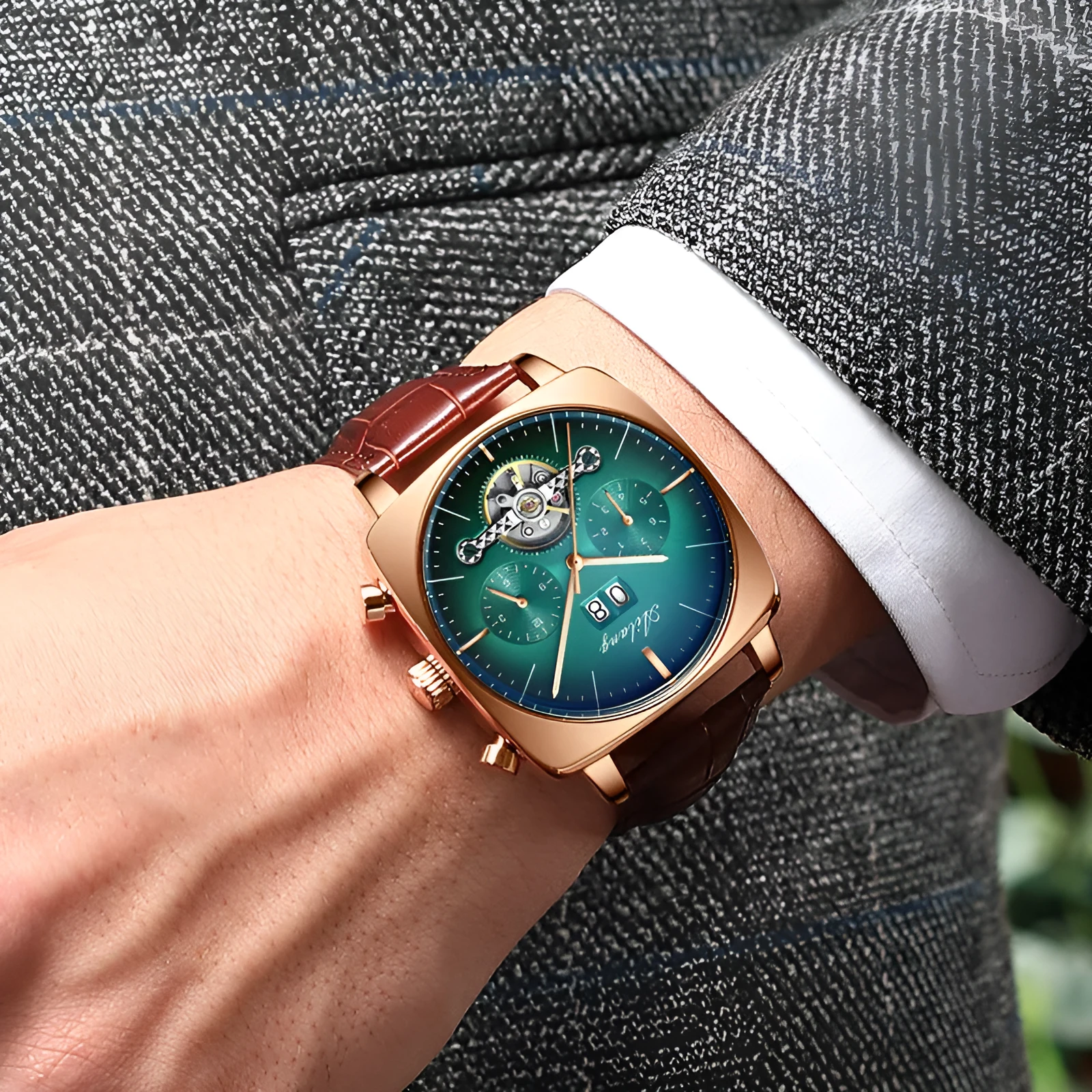 Men's automatic mechanical watch with black leather strap, hollow dial, and luminous hands on a white background