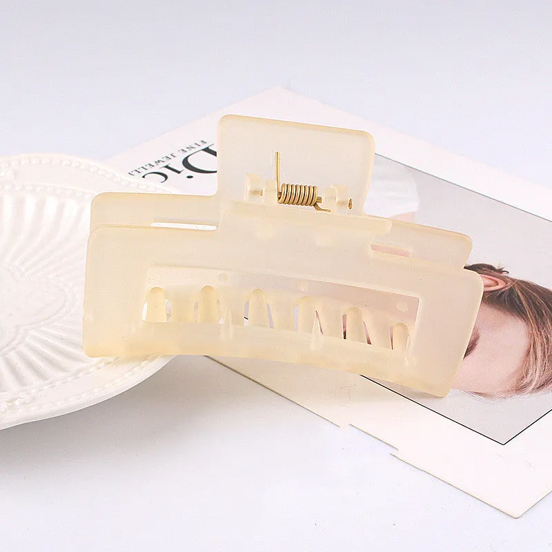 Geometric metal resin large shark hair clip in baking varnish finish, available in multiple colours