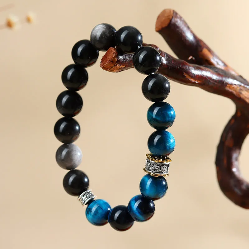 Handmade peacock blue Tigereye stone bracelet with geometric round beads and silver-coloured settings