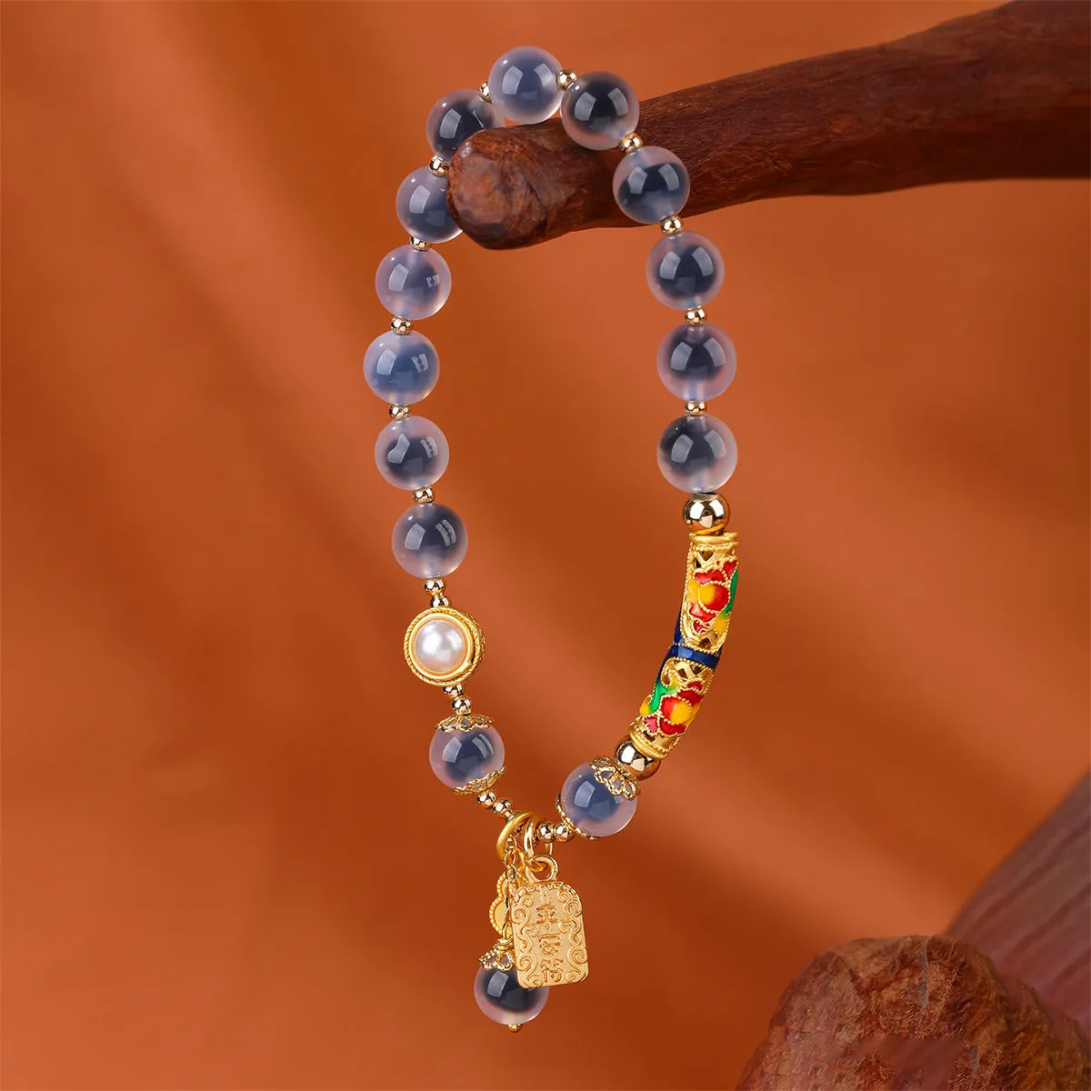 Handmade sugar heart agate bracelet in retro ethnic style with cherry blossom, peach blossom, and ping an pendant designs.