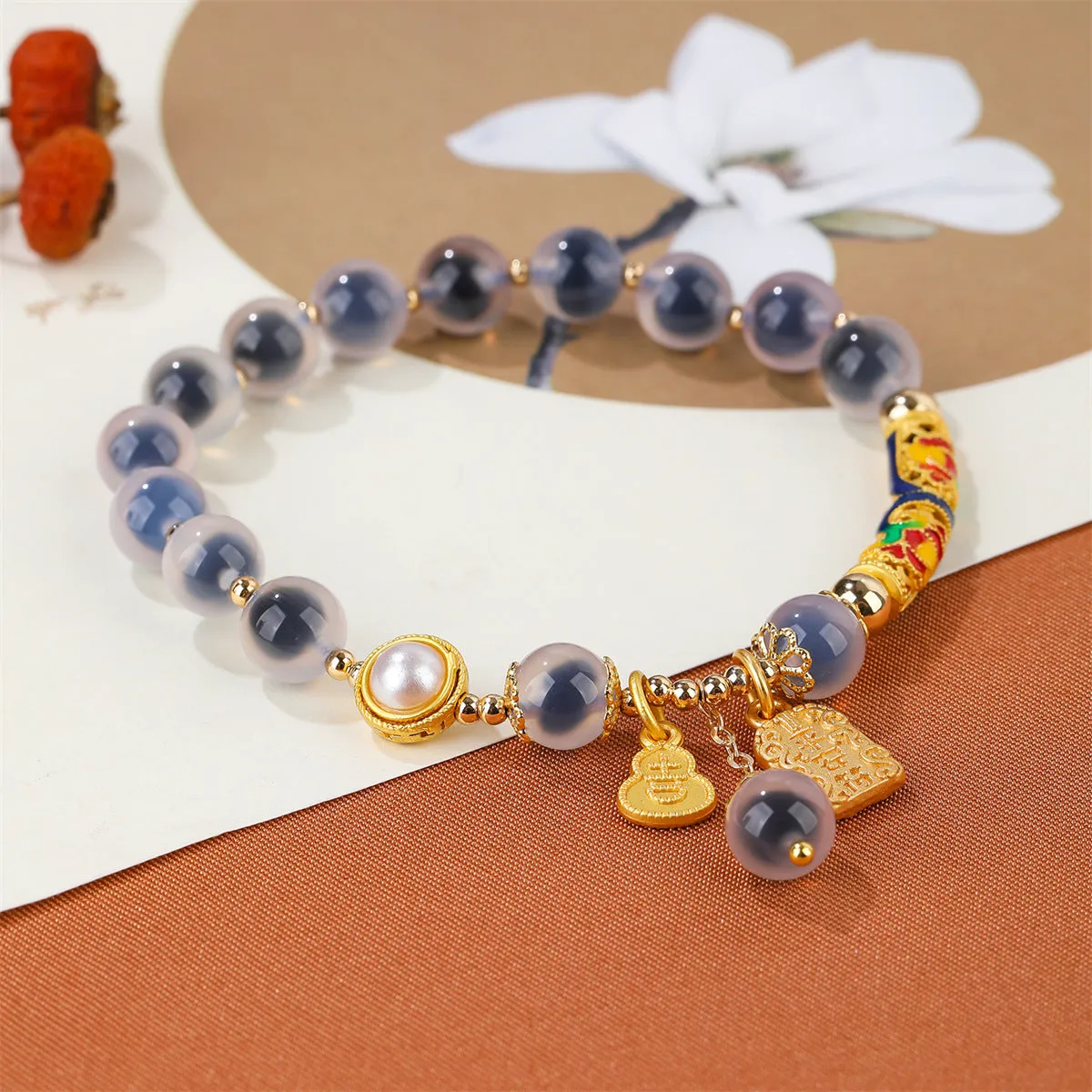 Handmade sugar heart agate bracelet in retro ethnic style with cherry blossom, peach blossom, and ping an pendant designs.