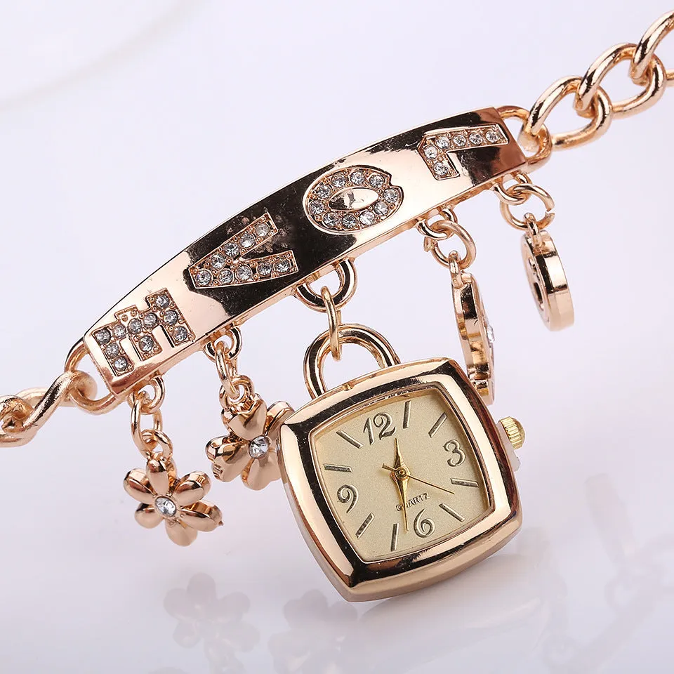 Women's alloy bracelet watch with square 22mm gold dial, alloy strap, and stainless steel pin buckle