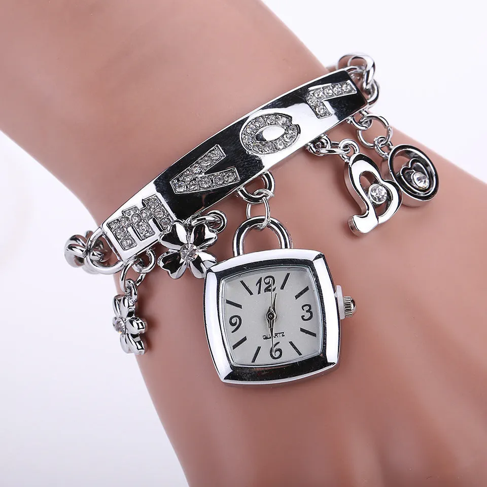 Women's alloy bracelet watch with square 22mm gold dial, alloy strap, and stainless steel pin buckle