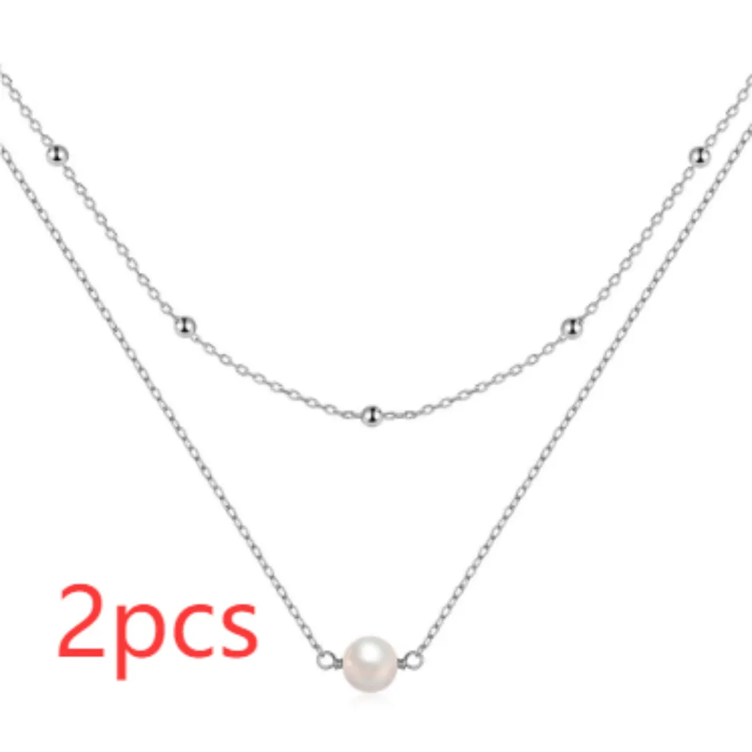 S925 sterling silver double-layer necklace with twin pearls on a ball bead chain.