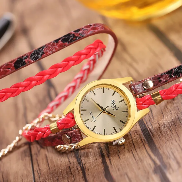 Women's casual watch with imitation leather strap and alloy pin buckle on white background