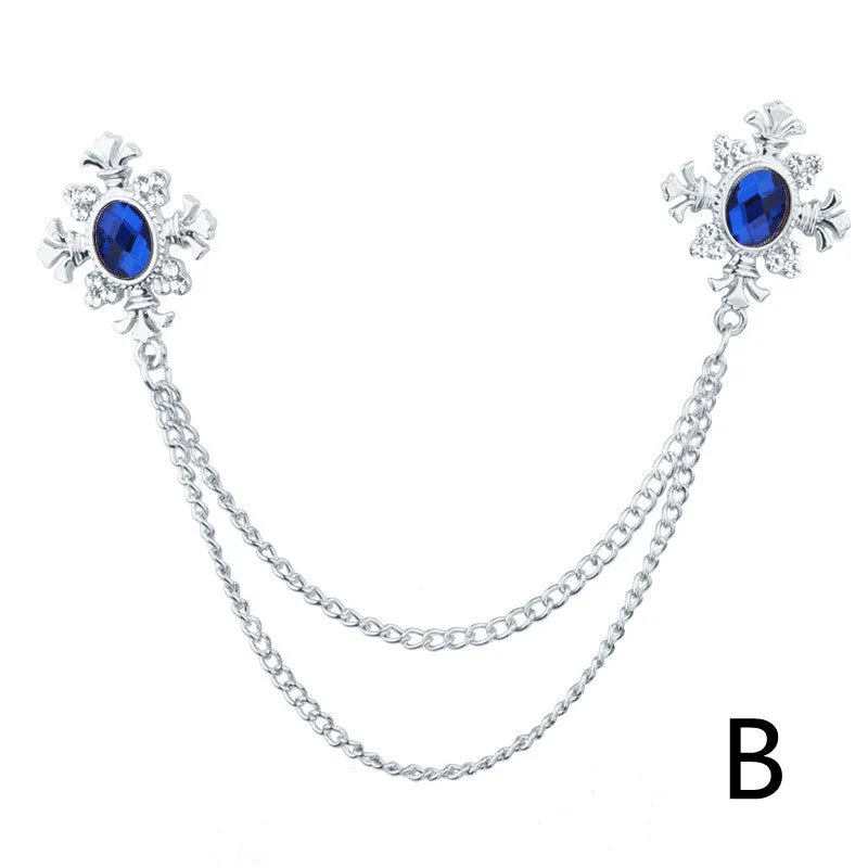Fringed rhinestone cross collar pin in alloy with electroplated finish and inlaid rhinestones.