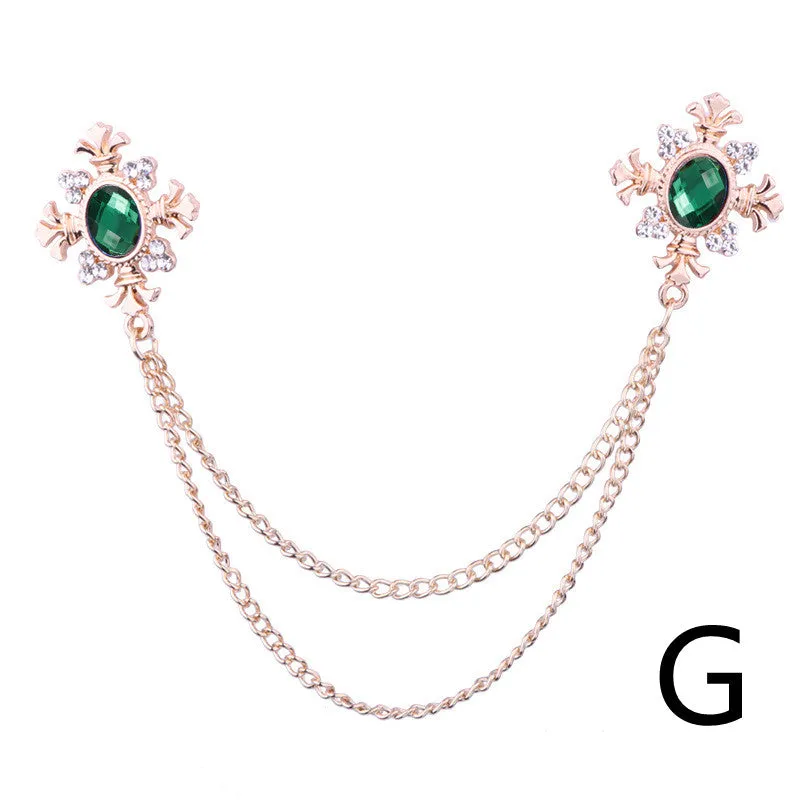 Fringed rhinestone cross collar pin in alloy with electroplated finish and inlaid rhinestones.