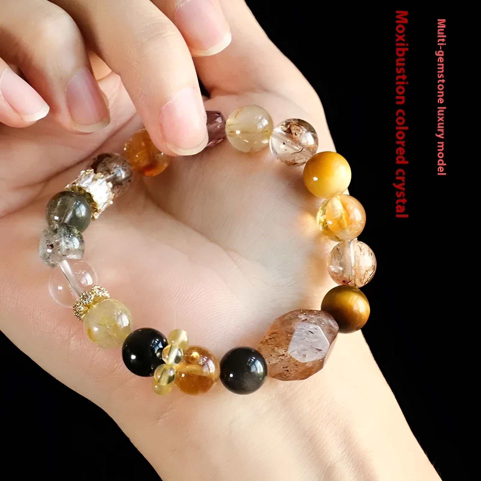 A women's bracelet featuring strands of natural Duobao crystal beads in a black and gold style.