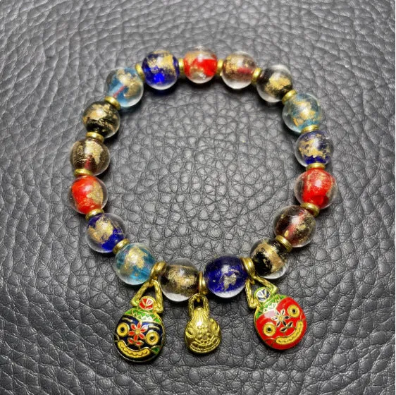 Geometric glass bracelet with auspicious patterns in red, purple, blue, green, black, or colourful.