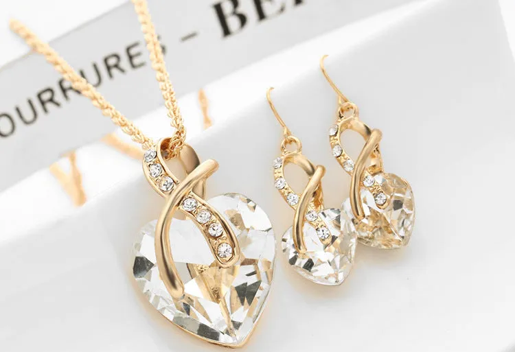 Heart shaped faux Austrian crystal zircon earrings with water wave chain in alloy, red colour option