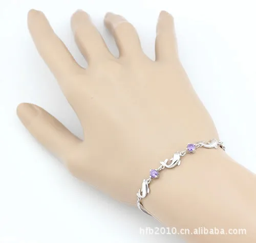 925 sterling silver heart-shaped bracelet with inlaid diamond style, available in purple and white on wrist