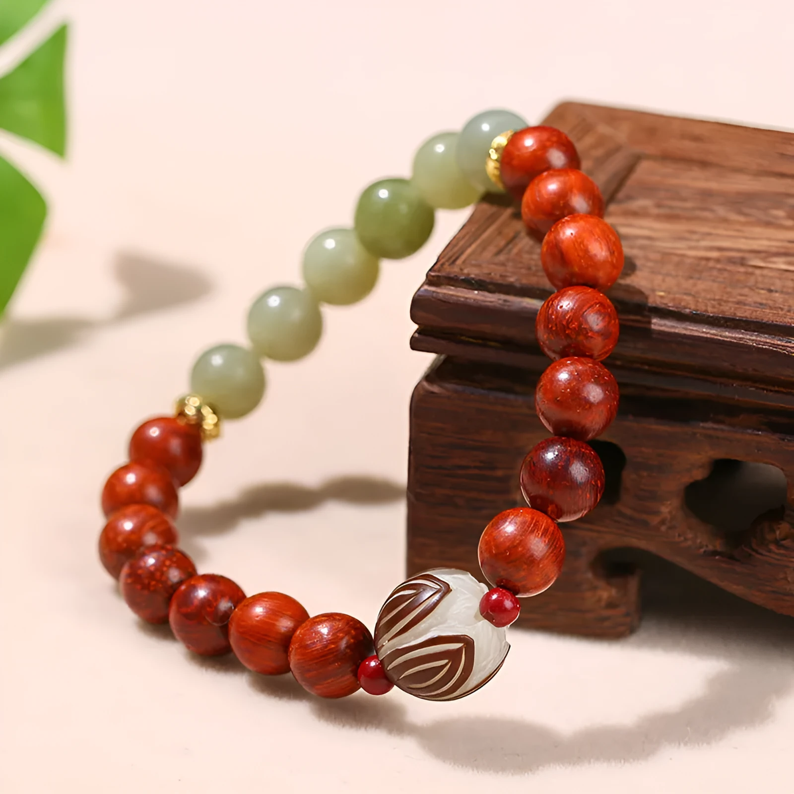 Chinese style red rosewood and gray jade bracelet with Bodhi Lotus design and 8 round beads.