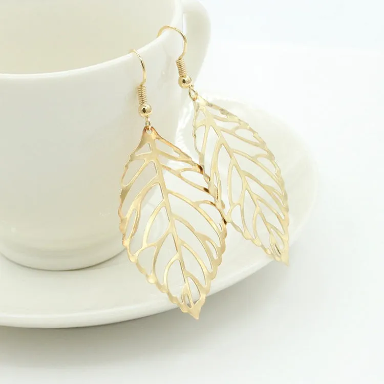 Triangle shaped alloy earrings for women in green colour option