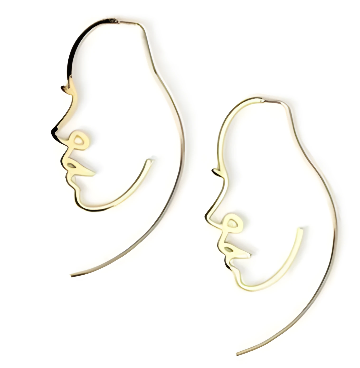 Creative abstract face contour earrings in metal gold finish on a white background
