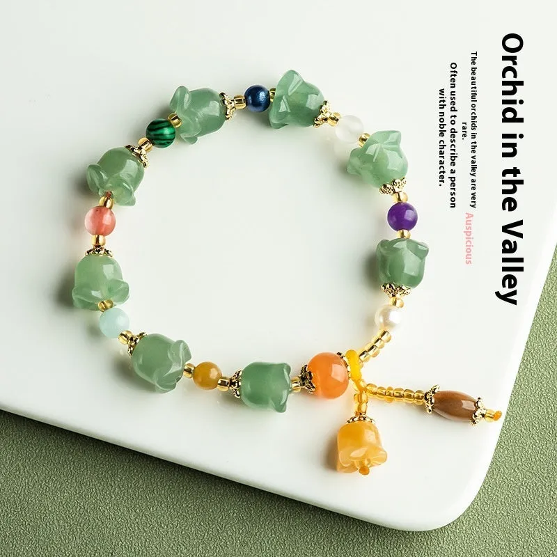 Natural Xinjiang Jinsi Jade Aventurine Orchid bracelet with carved orchid beads for women.