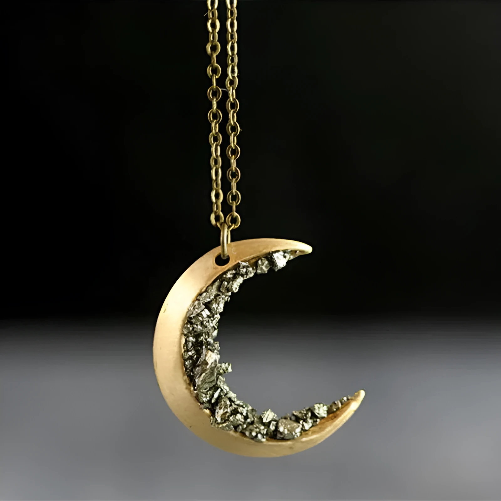 Ancient gold electroplated alloy crescent necklace with broken crystal pendant on 46cm chain