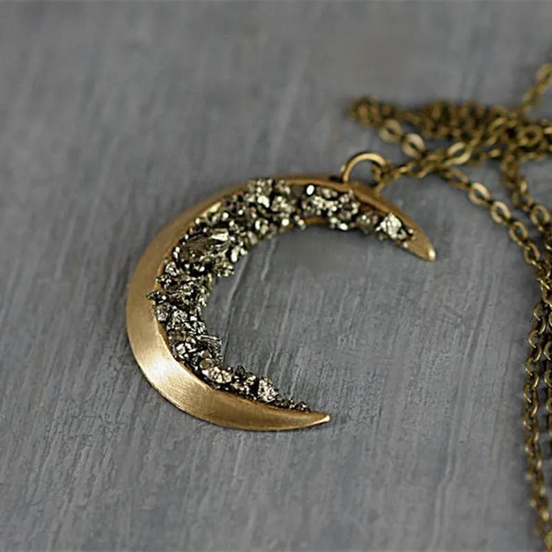 Ancient gold electroplated alloy crescent necklace with broken crystal pendant on 46cm chain