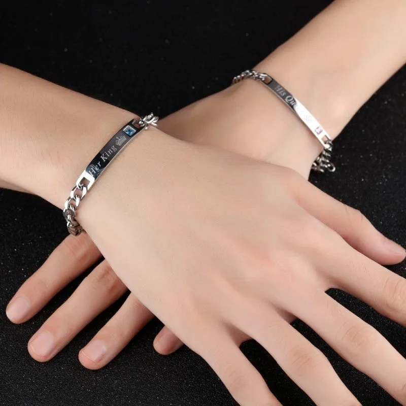 Set of two titanium steel charm bracelets, black Her King and rose gold His Queen, with heart charms on link chain
