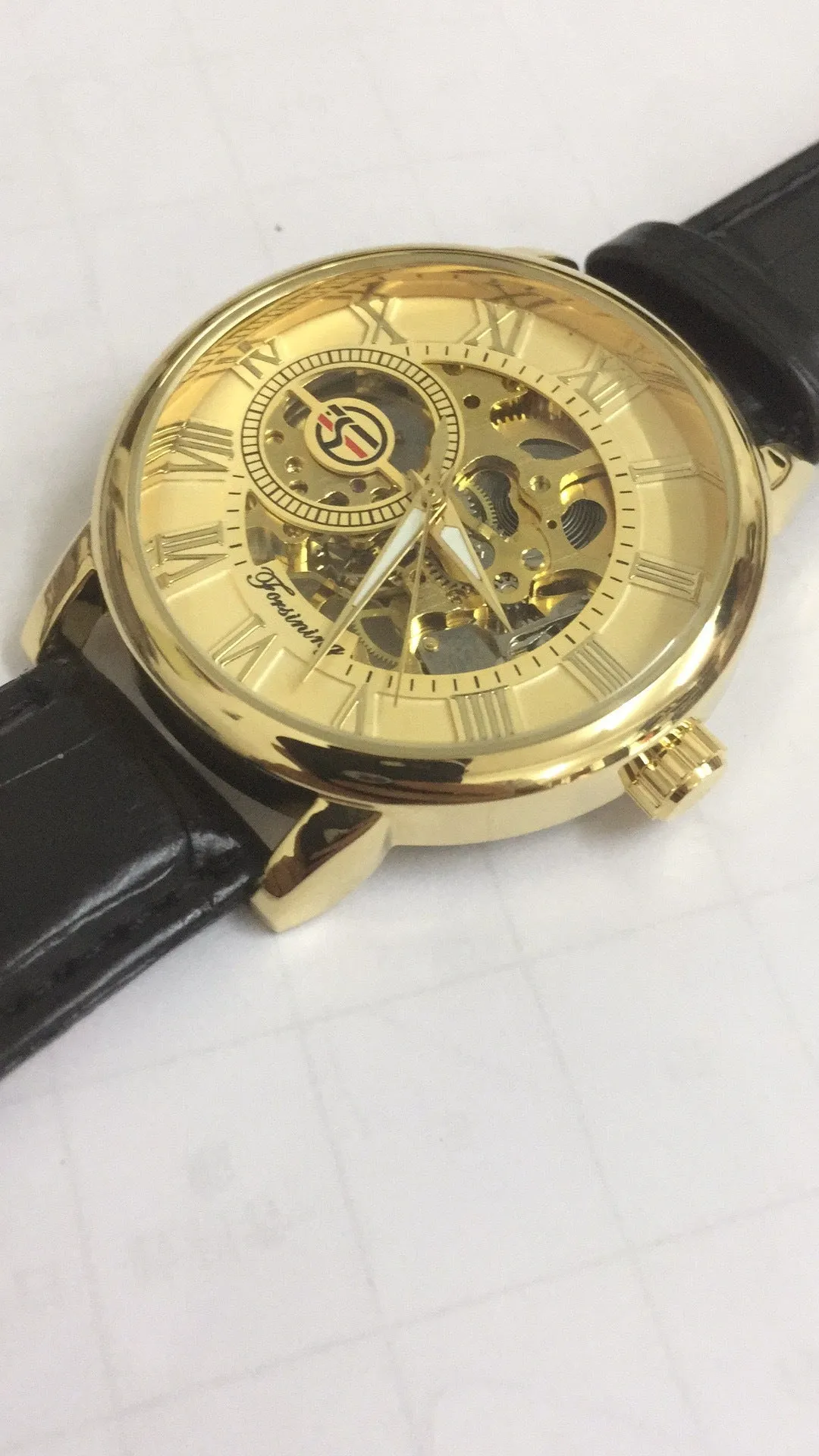 Hollow mechanical skeleton wrist watch with leather band and stainless steel 40.5mm case