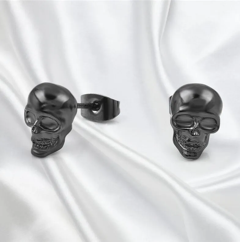 Small punk skull stud earrings in white copper with black colour, push-back closure