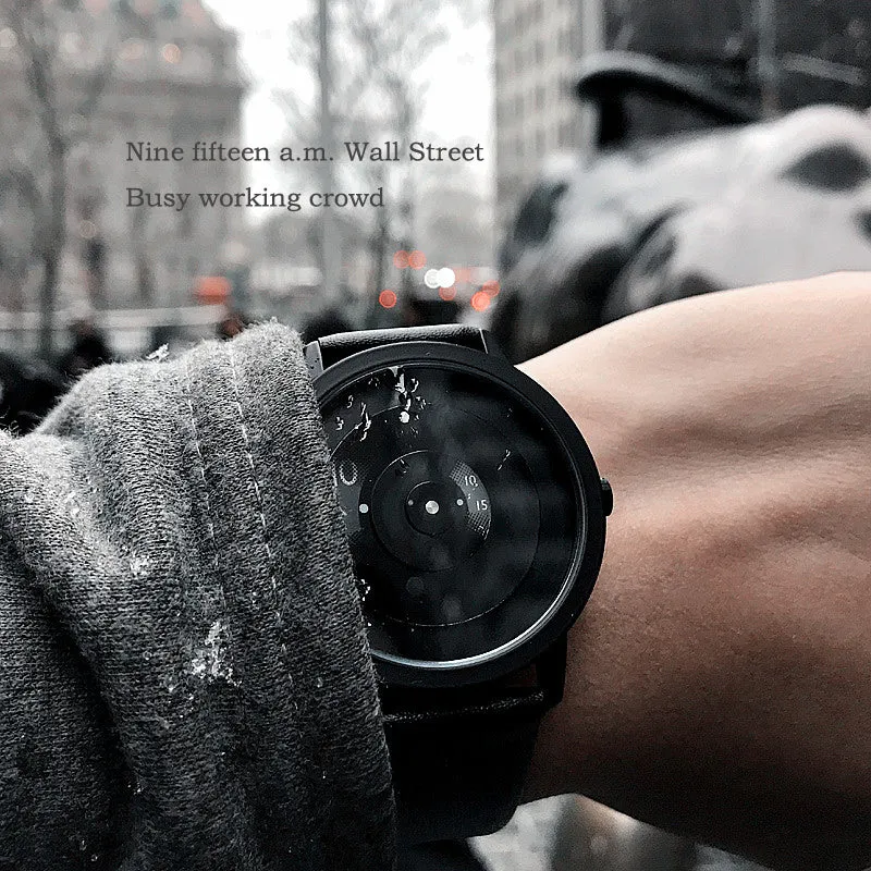 Casual unisex handless watch with pointer display, round dial, alloy case, and imitation leather strap on wrist