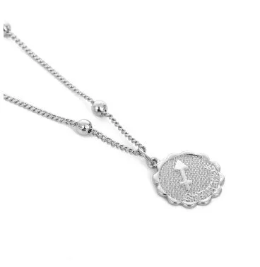 Gold plated metal zodiac constellation pendant necklace with bead chain on white background