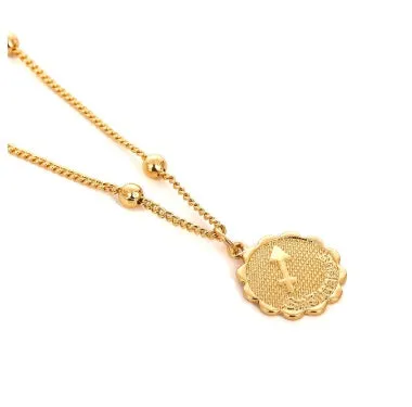 Gold plated metal zodiac constellation pendant necklace with bead chain on white background