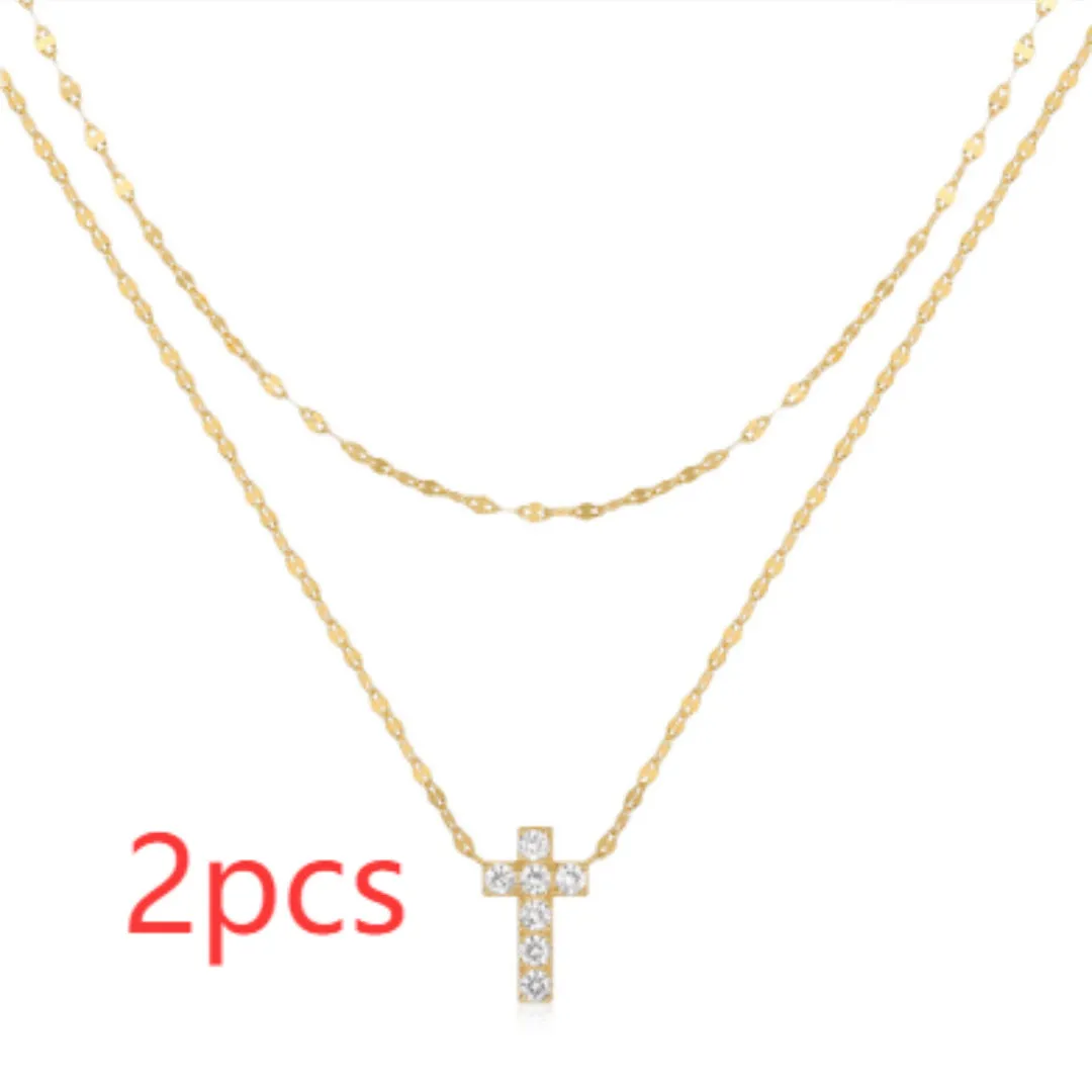 S925 sterling silver double-layer twin diamond cross pendant necklace on a delicate clavicle chain.