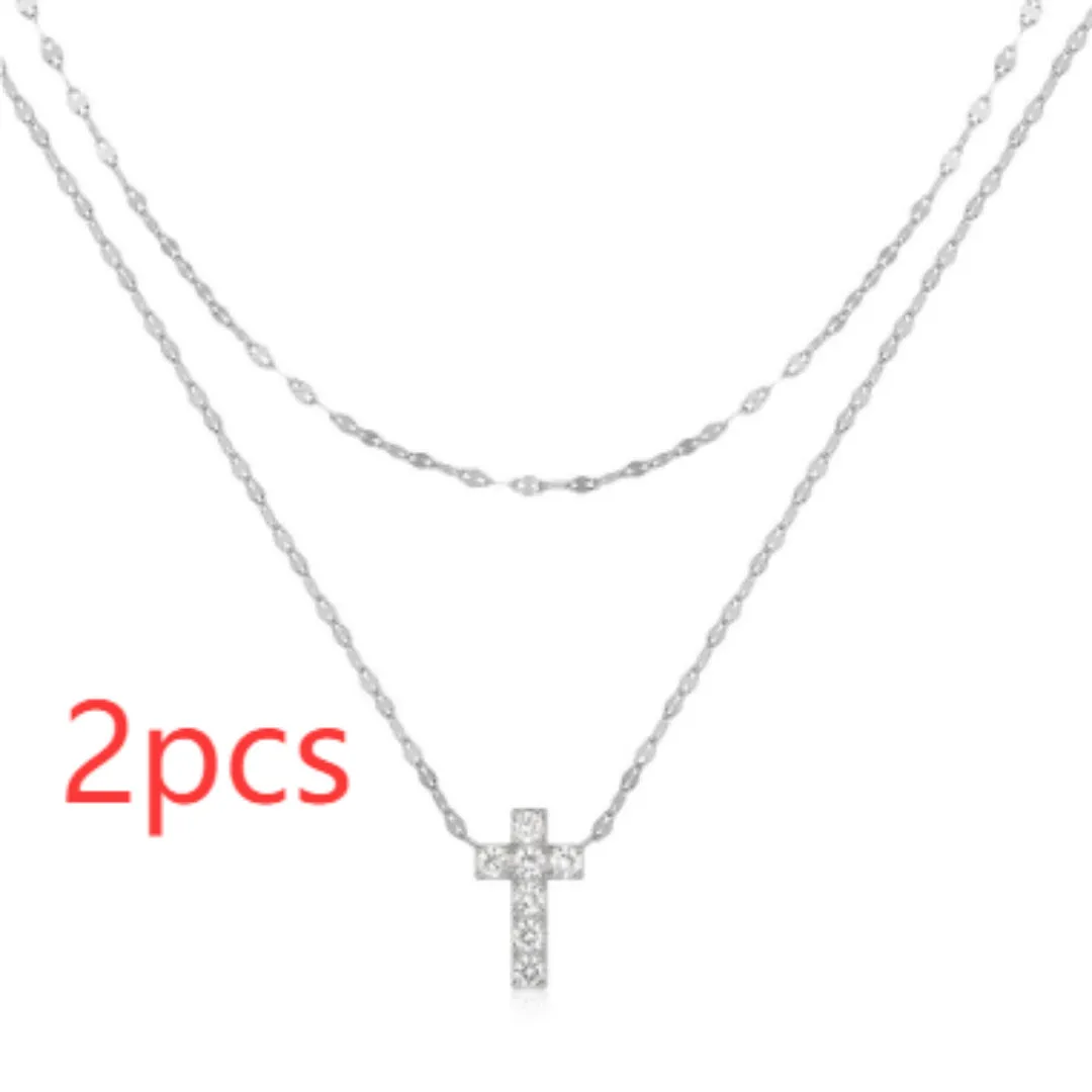 S925 sterling silver double-layer twin diamond cross pendant necklace on a delicate clavicle chain.