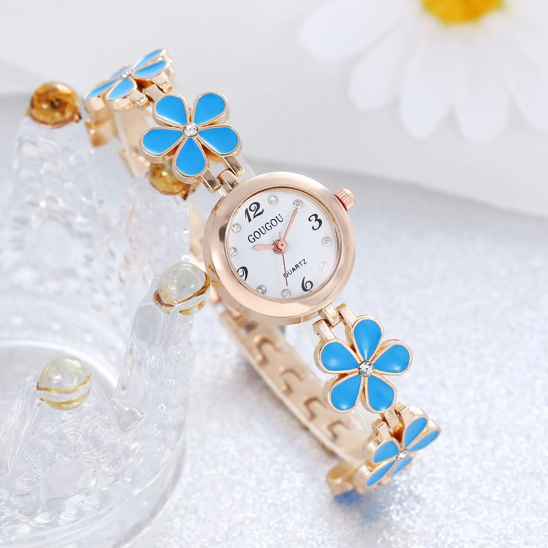 Ladies petal patterned quartz watch with alloy case and matching bracelet in white colour option