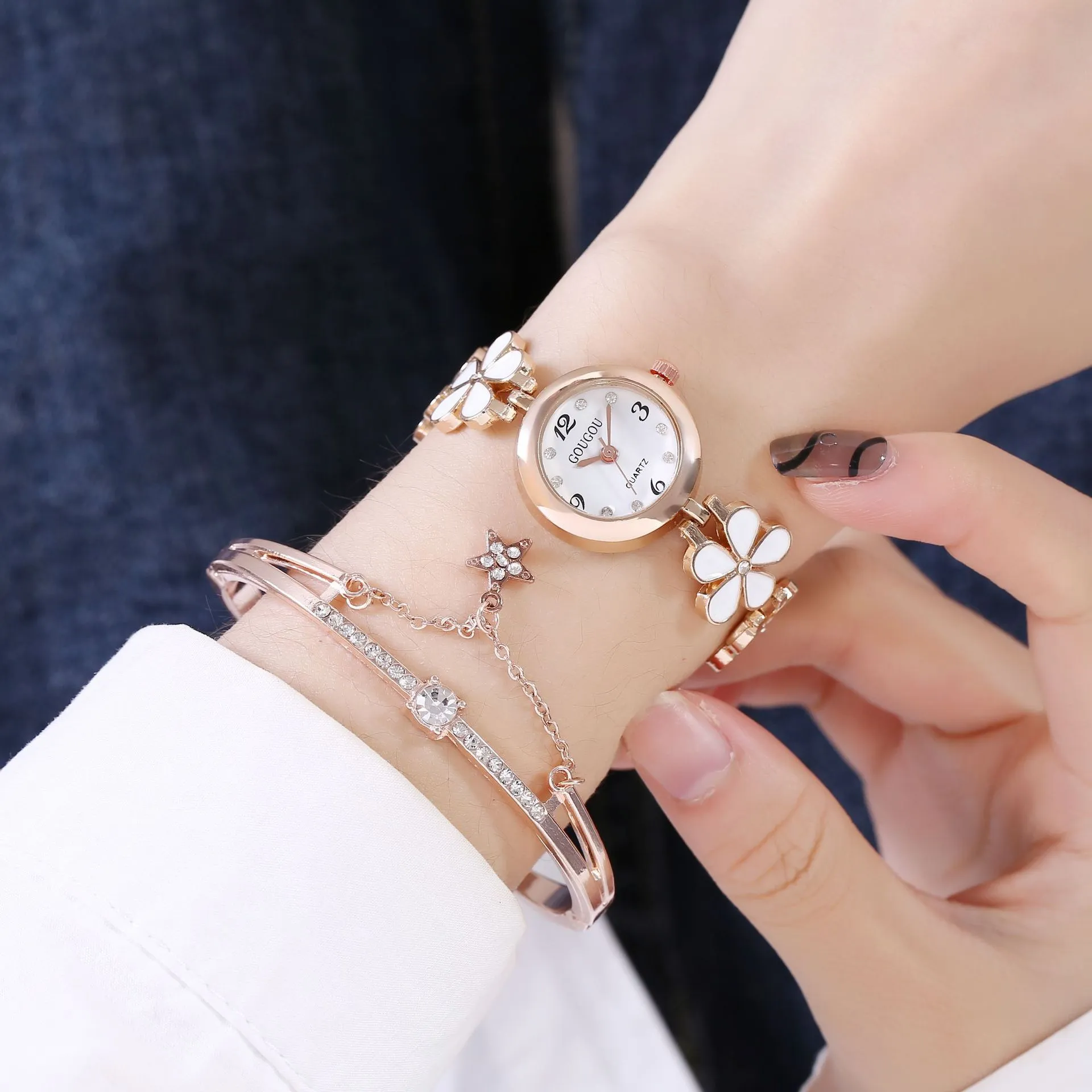 Ladies petal patterned quartz watch with alloy case and matching bracelet in white colour option