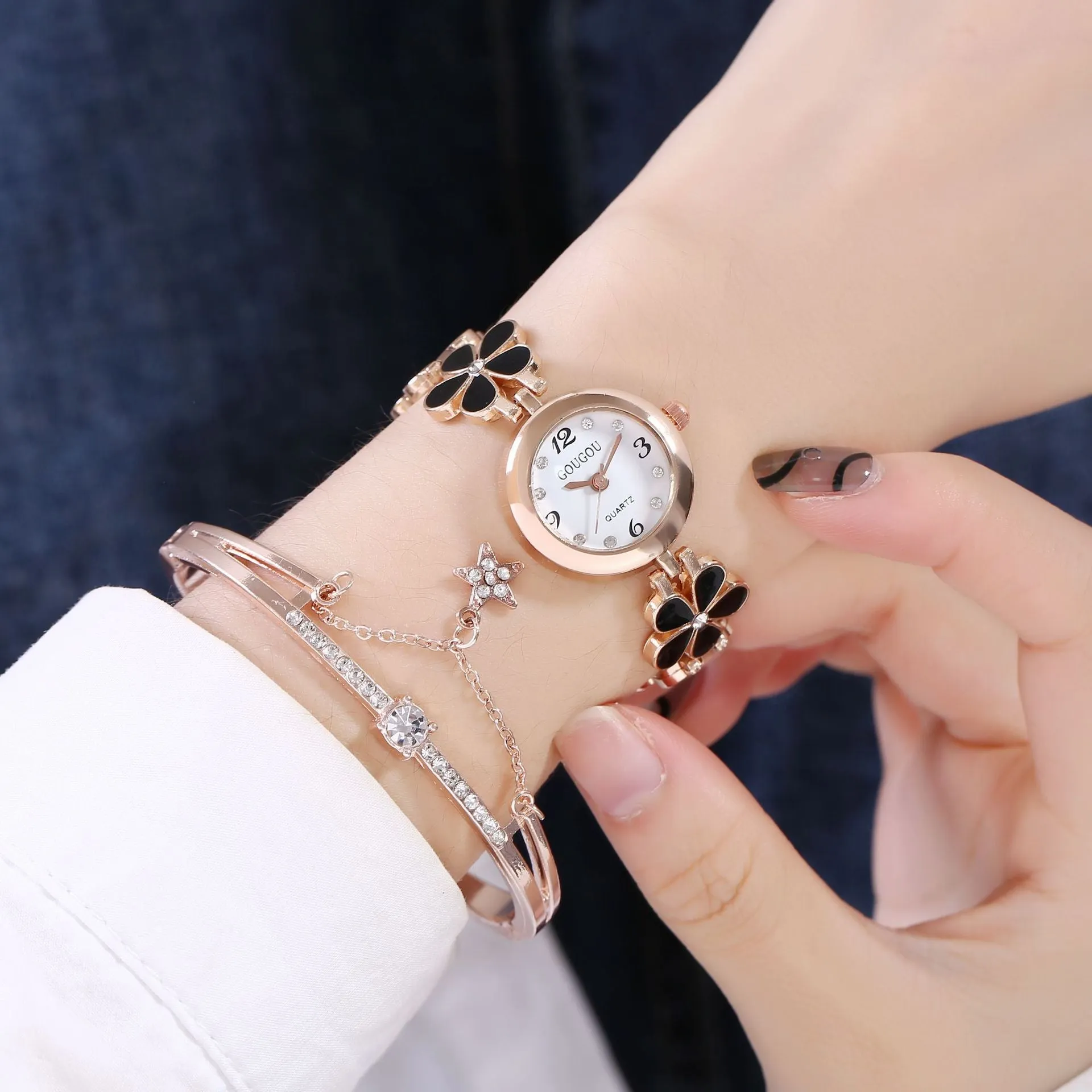 Ladies petal patterned quartz watch with alloy case and matching bracelet in white colour option