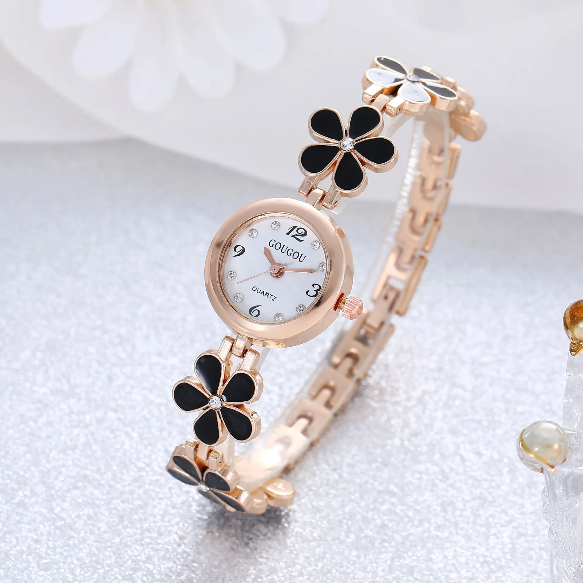 Ladies petal patterned quartz watch with alloy case and matching bracelet in white colour option