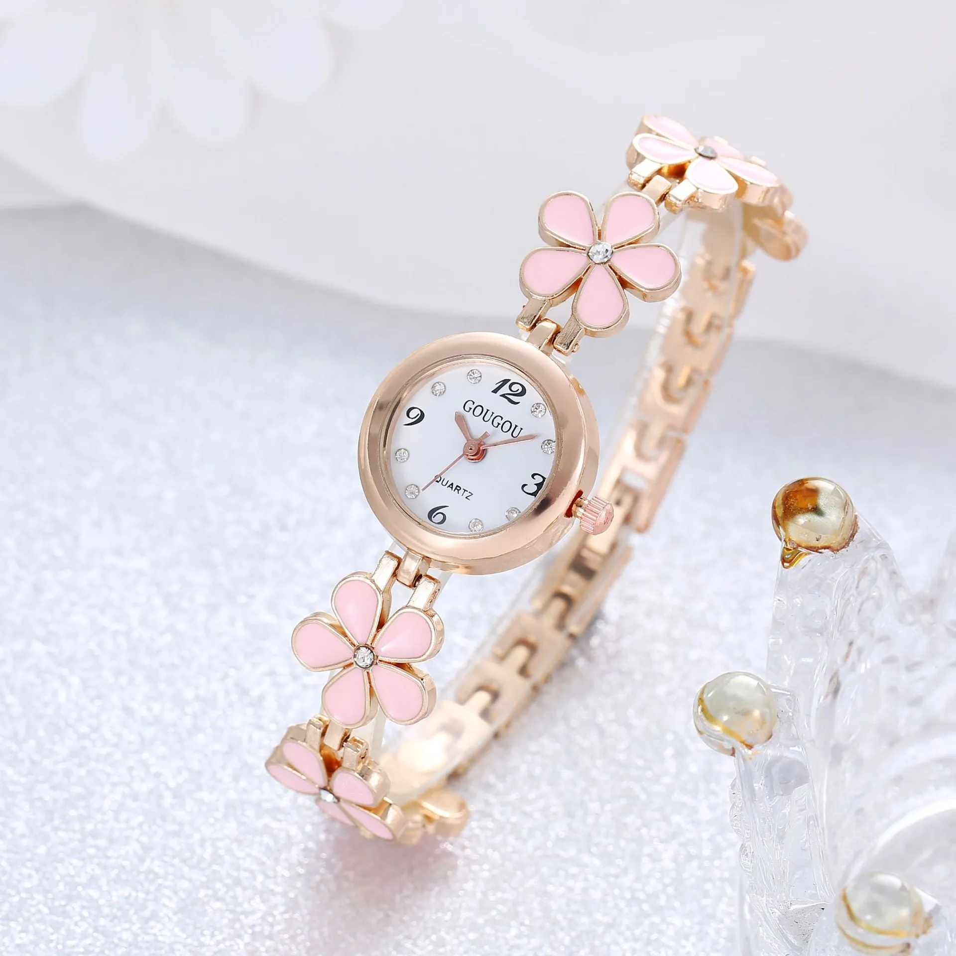Ladies petal patterned quartz watch with alloy case and matching bracelet in white colour option