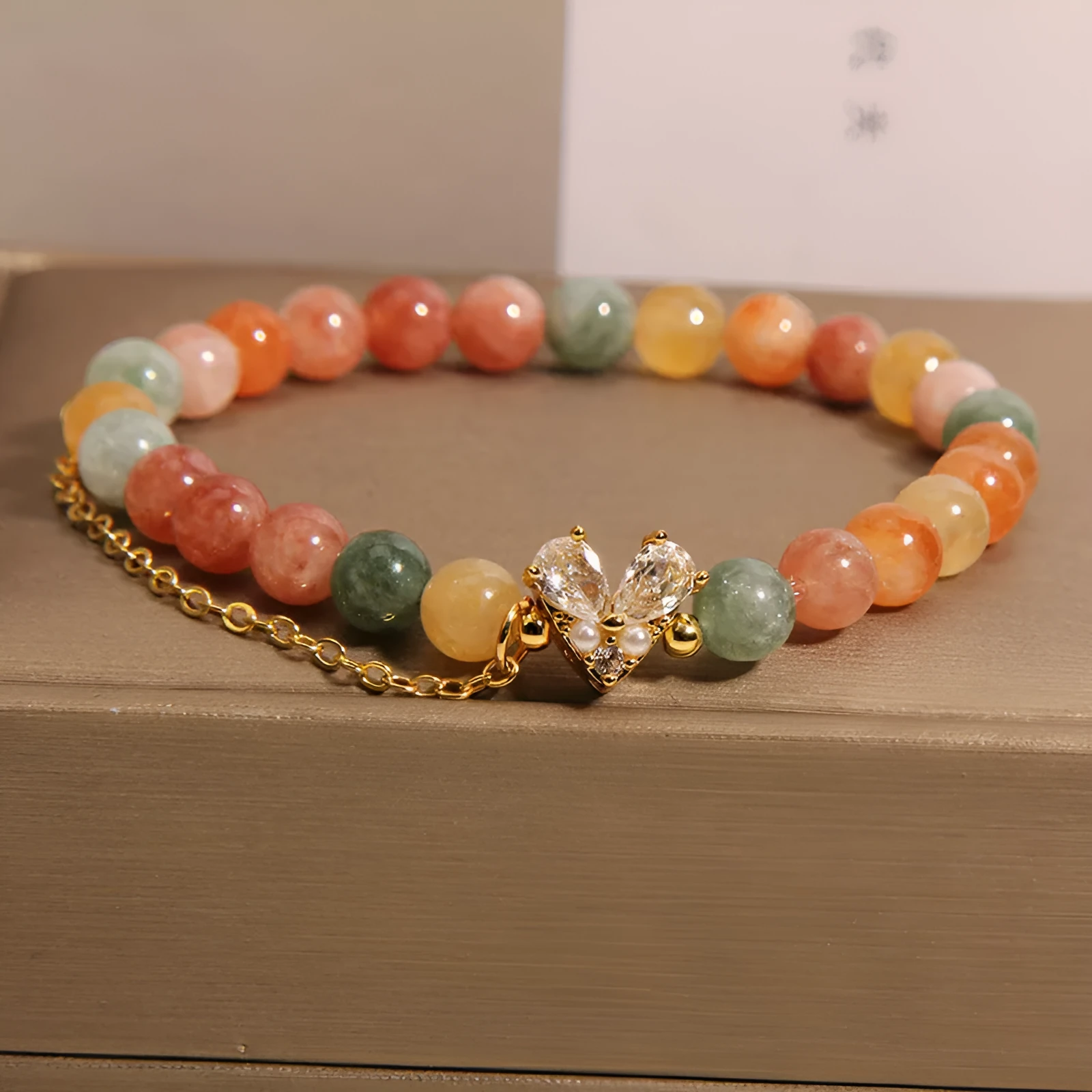 Women's Fu Lu Shou crystal bracelet with a central V-shaped zircon detail on a clear band