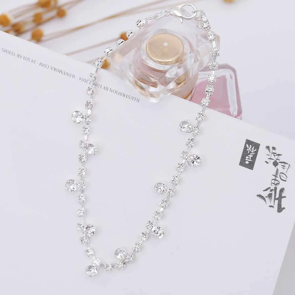 Women's silver alloy water drop tassel anklet with adjustable chain and artificial gem inlay