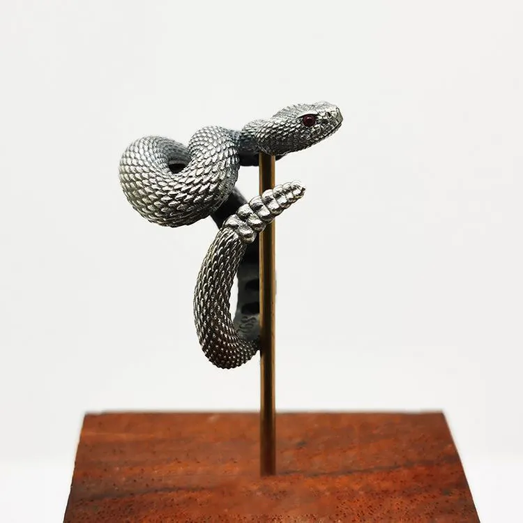 Rattlesnake ring in alloy with black closed finish retro style electroplating on white background