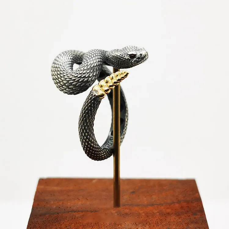 Rattlesnake ring in alloy with black closed finish retro style electroplating on white background