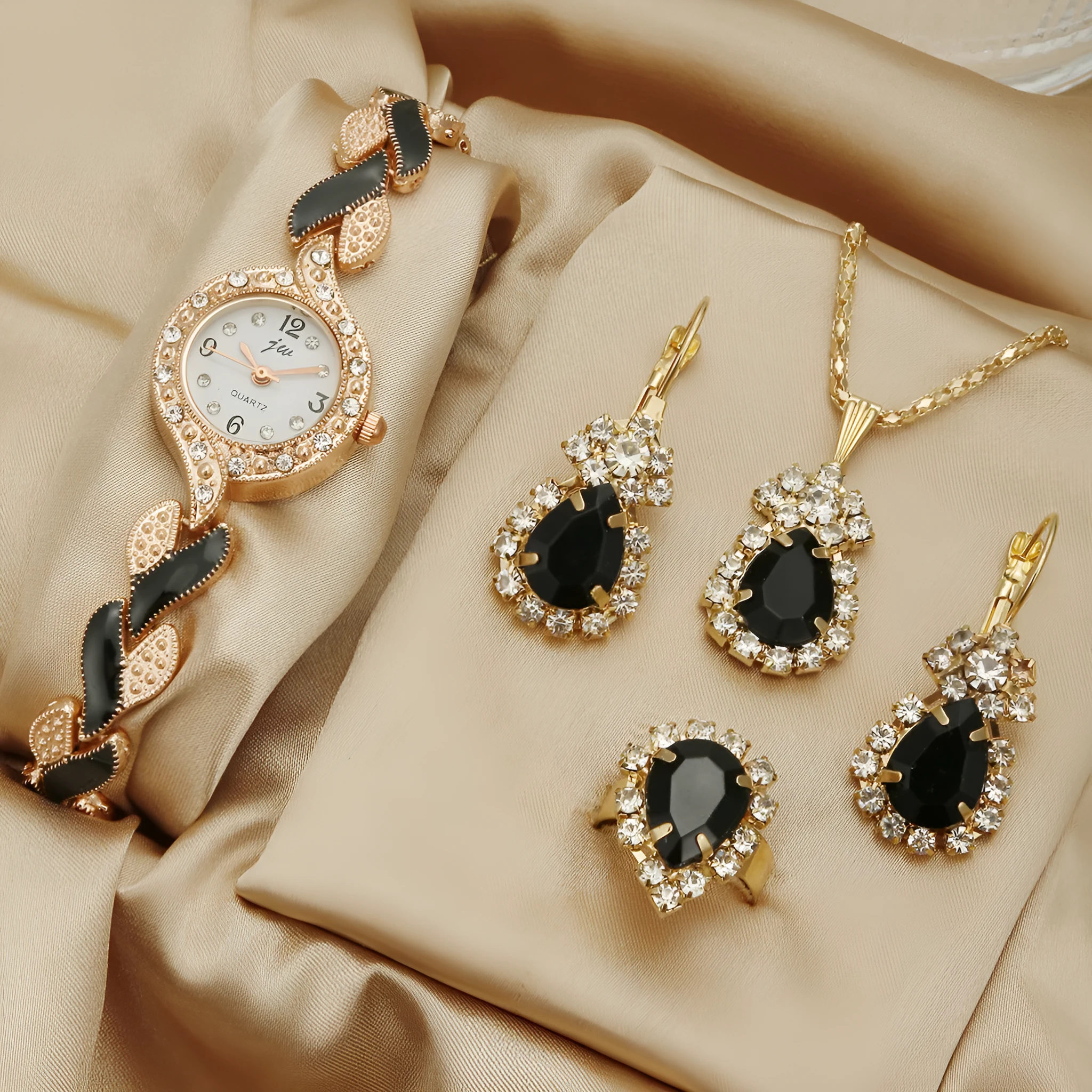 Women's love strap diamond watch with matching earrings, ring, and necklace in black suit option