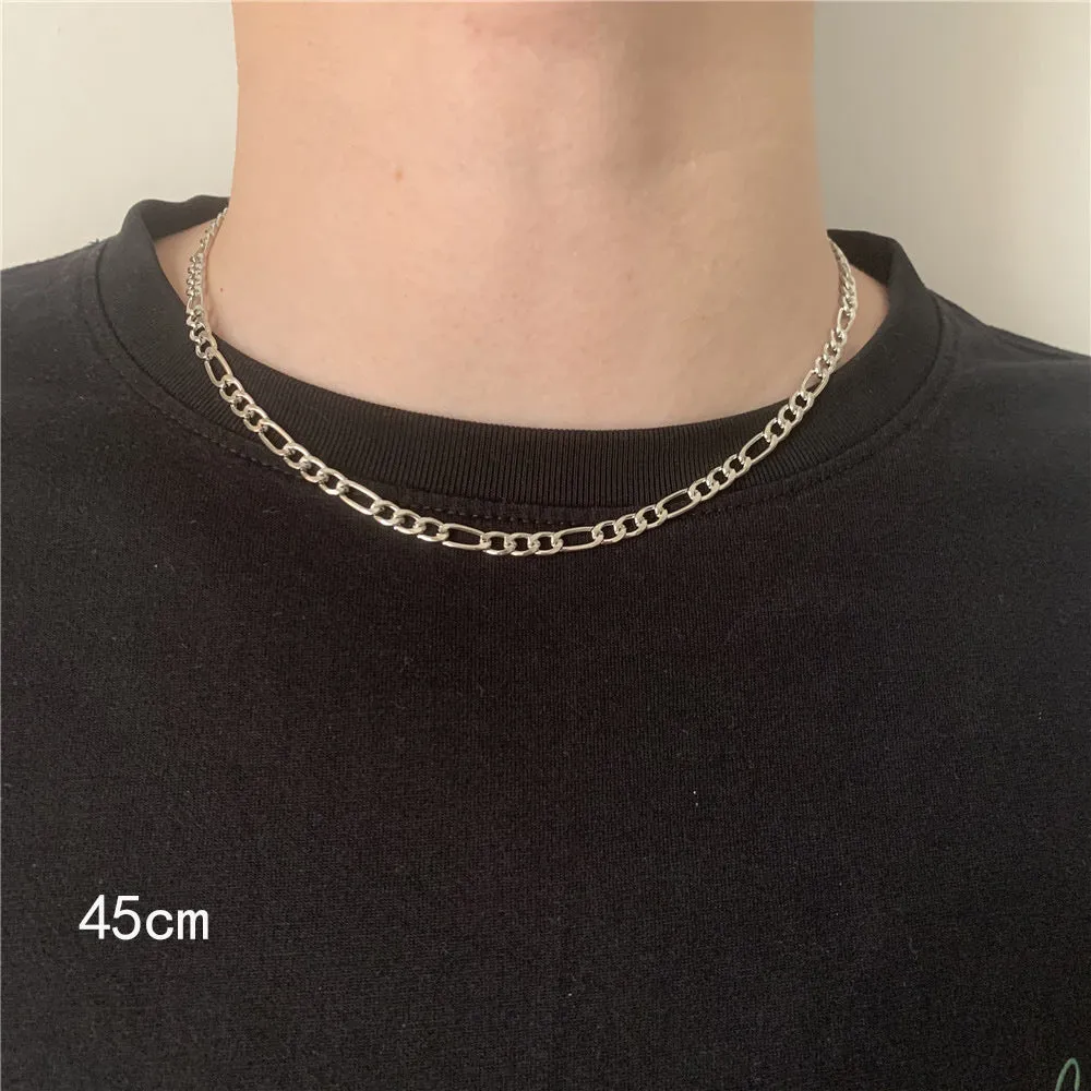 Men's simple electroplated alloy necklace in gold on a grey background
