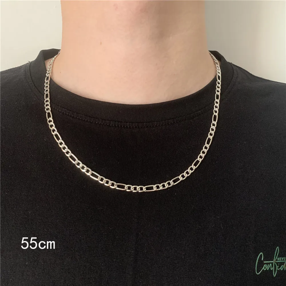 Men's simple electroplated alloy necklace in gold on a grey background